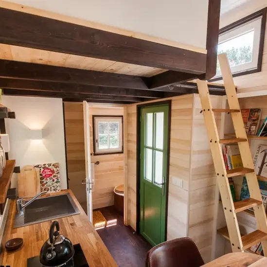 0511 Stunning tiny house with green roof which is the best integrated into a natural environment smallhometours.com 2