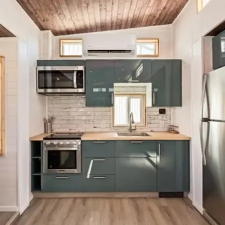 0521 Spectacular expanding tiny house that goes from 8 ft wide to 16 ft wide at the push of a button smallhometours.com 3