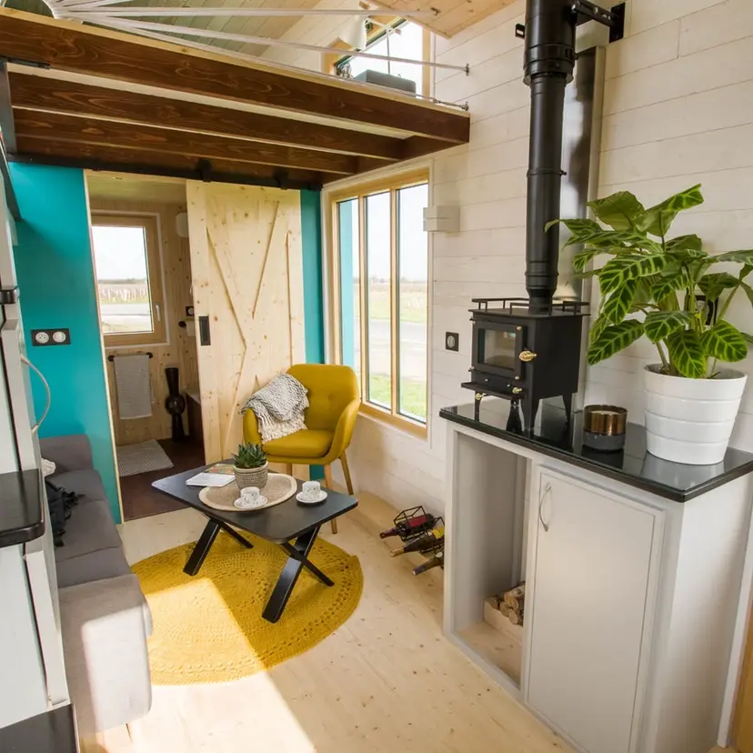 0528 Beautiful tiny house with many windows that make it a bright and pleasant space to live smallhometours.com 12