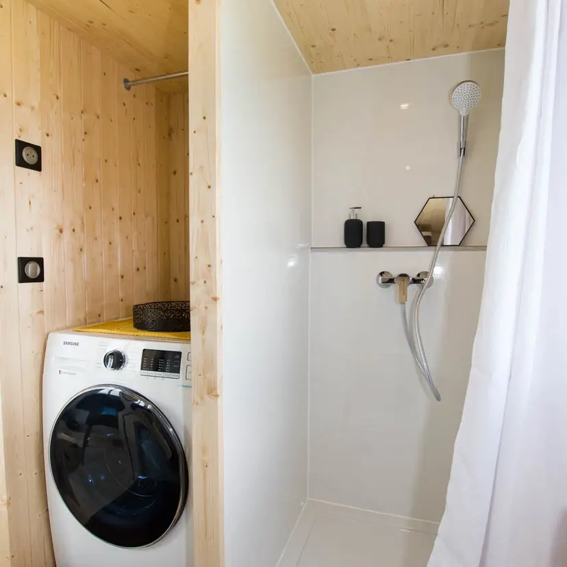 0528 Beautiful tiny house with many windows that make it a bright and pleasant space to live smallhometours.com 2