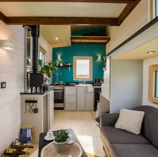 0528 Beautiful tiny house with many windows that make it a bright and pleasant space to live smallhometours.com 5