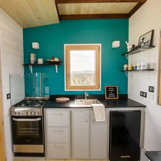 0528 Beautiful tiny house with many windows that make it a bright and pleasant space to live smallhometours.com 9
