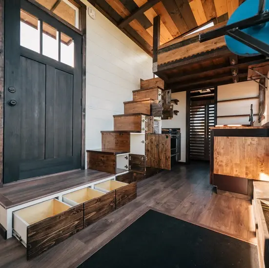 0533 Stunning 26 tiny house with crossfit workout gymnastics rings in living room smallhometours.com 1