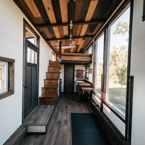 0533 Stunning 26 tiny house with crossfit workout gymnastics rings in living room smallhometours.com 13