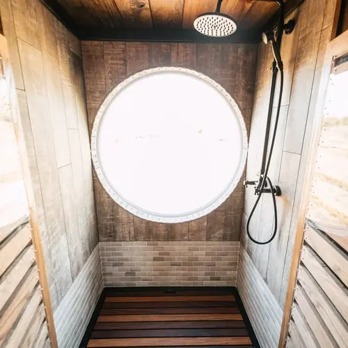 0533 Stunning 26 tiny house with crossfit workout gymnastics rings in living room smallhometours.com 2