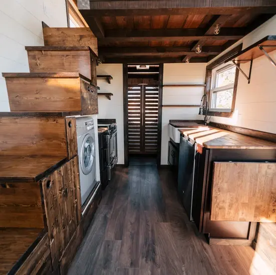 0533 Stunning 26 tiny house with crossfit workout gymnastics rings in living room smallhometours.com 8
