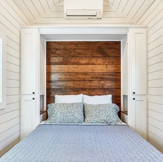 0543 A modern tiny house with open design a sleeping loft full kitchen and spacious bathroom smallhometours.com 1