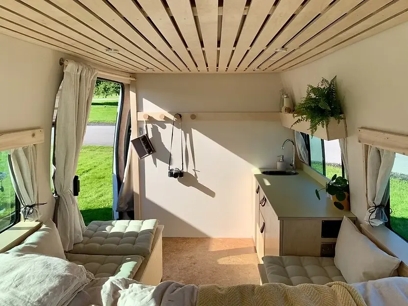 0576 Beautiful Ford transit campervan with organic spaces functionality and simplistic living smallhometours.com 1