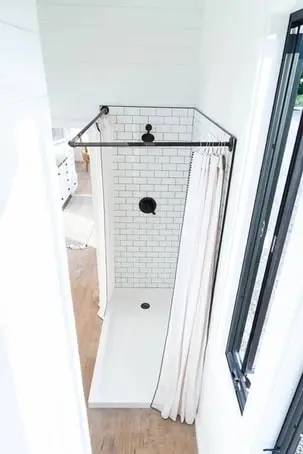 0589 Beautiful and affordable tiny home with full size walk in shower smallhometours.com 3