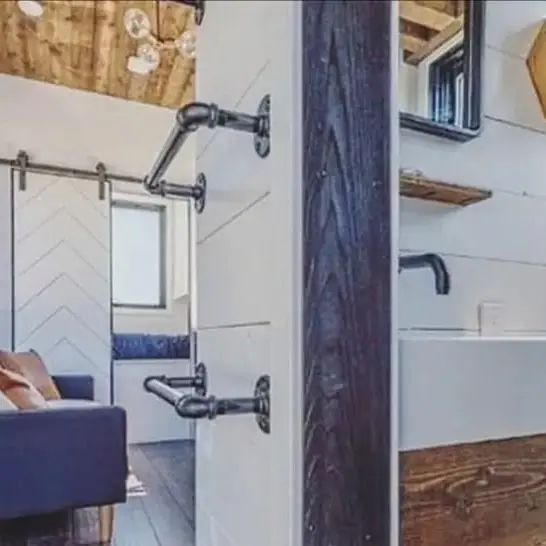 0595 Gorgeous tiny house with fold down porch and a bedroom on the main floor smallhometours.com 8