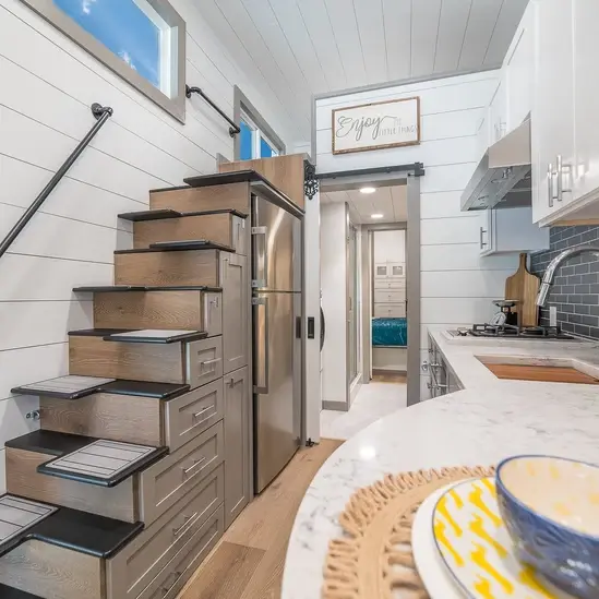 0601 Gorgeous 32 tiny house with 2′ extension on the rear making it 34′ over its entirety smallhometours.com 1