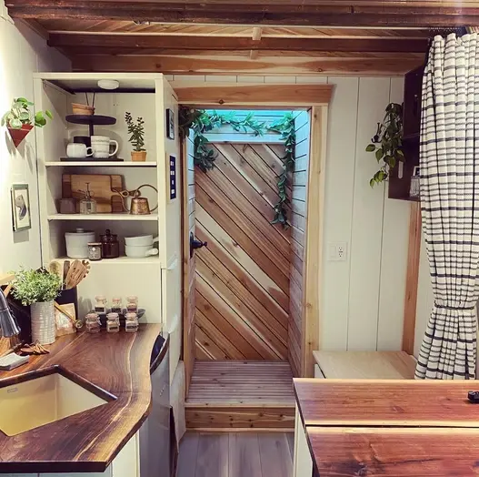 0603 Super cozy tiny home with skylit shower skylit loft bedroom smallhometours.com 4