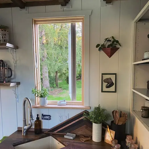 0603 Super cozy tiny home with skylit shower skylit loft bedroom smallhometours.com 8