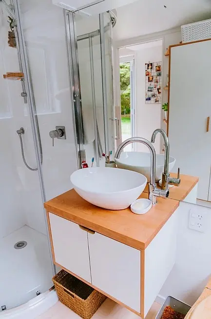 0611 Gorgeous tiny house on wheels with DIYer design smallhometours.com 6