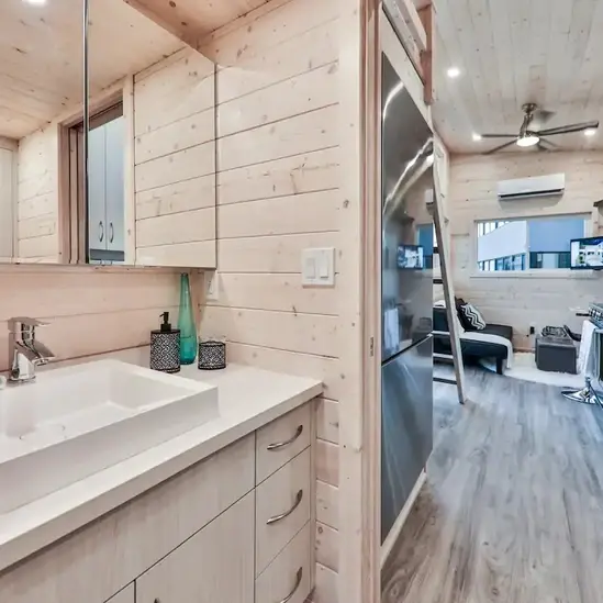 0613 Beautiful tiny house with a modern interior and a unique floor plan smallhometours.com 10