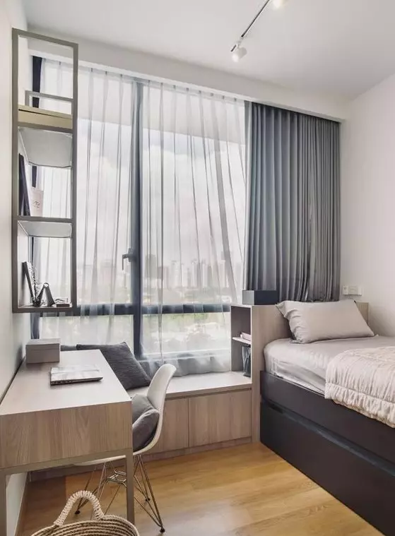 a contemporary teen room with a storage bed a windowsill seat a matching desk and a shelf on the wall