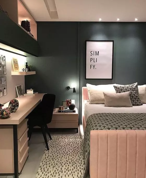 a stylish teen girl bedroom in hunter green and blush with built in storage lights and cool printed