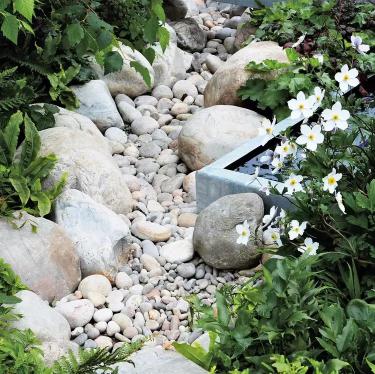 River Rock Landscaping Ideas for Beautiful Backyards and Outdoor Spaces