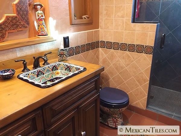 25 Vibrant Mexican Bathroom Sink and Vanity Ideas You Have to See Featuring Painted Ceramic Basin Bowl smallhometours.com 17