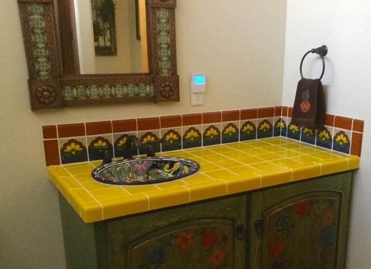 25 Vibrant Mexican Bathroom Sink and Vanity Ideas You Have to See Featuring Painted Ceramic Basin Bowl smallhometours.com 19