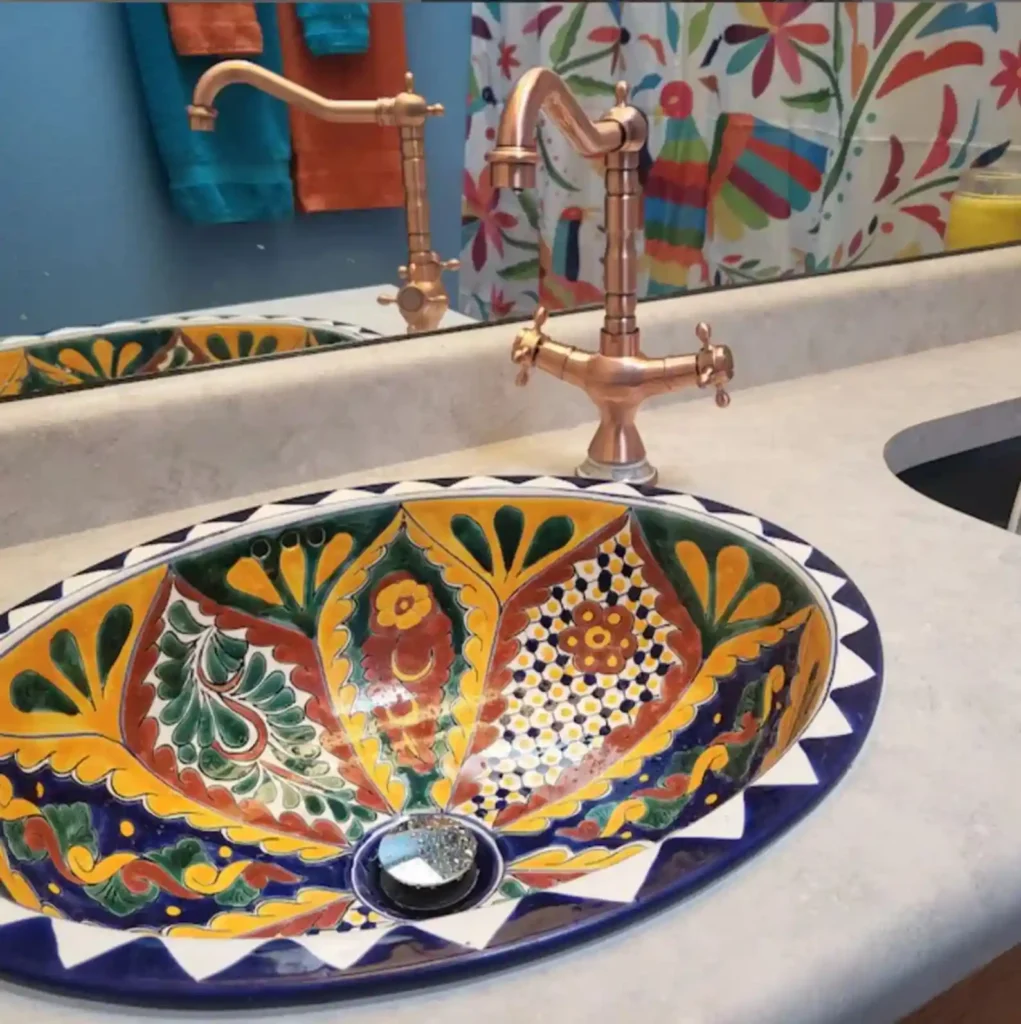 25 Vibrant Mexican Bathroom Sink and Vanity Ideas You Have to See Featuring Painted Ceramic Basin Bowl smallhometours.com 2