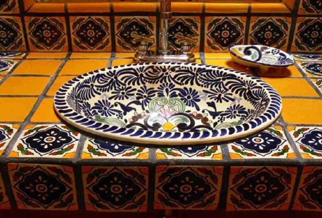 25 Vibrant Mexican Bathroom Sink and Vanity Ideas You Have to See Featuring Painted Ceramic Basin Bowl smallhometours.com 9